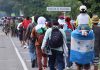 Ni la lluvia frena caravana de más de 600 migrantes; ¿quiénes son y hacia dónde van?