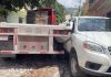 Tráiler se va de reversa y atropella a adulto mayor